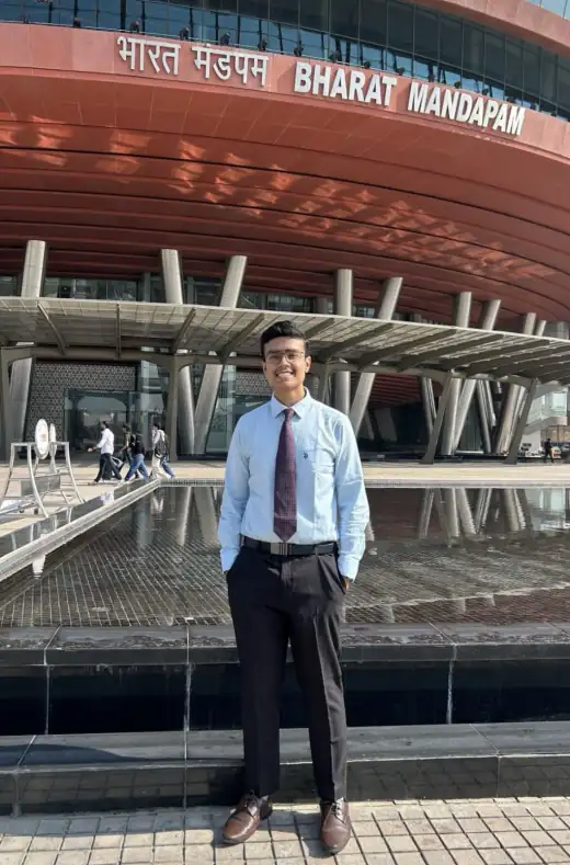 Arav standing outside the Bharat Mandapam convention centre in New Delhi