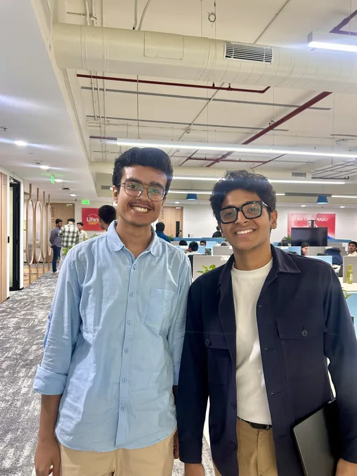 Arav with a fellow builder at the Build with Replit buildathon in Mumbai